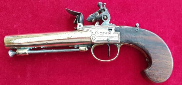 A scarce continental all brass flintlock pistol engraved Godin Liege. Circa 1800. Ref 2590